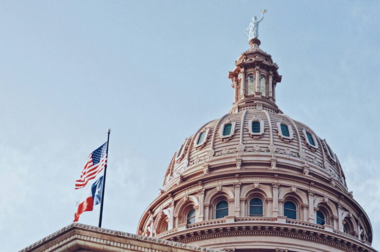 austin capitol dome and flags exterior